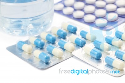 Package Of Medicine Pill On White Table Stock Photo