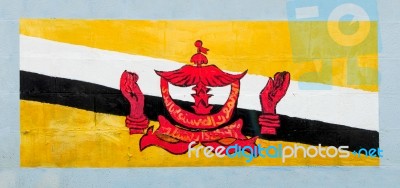 Painting Flag Of  Brunei Darussalam  On Wall Stock Photo