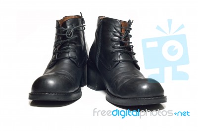 Pair Of Black Leather Women's Boots On A White Background Stock Photo