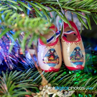 Pair Of Dutch Clogs On A Christmas Tree Stock Photo