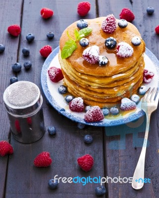 Pancakes With Honey And Berries Stock Photo