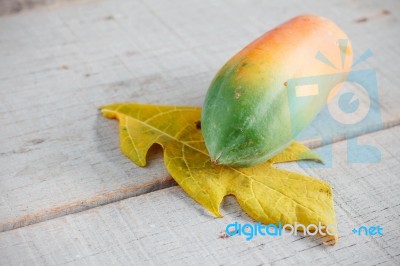 Papaya On Wooden Stock Photo