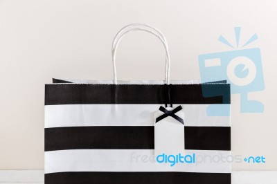 Paper Shopping Bag With Gift Tag And Ribbon Stock Photo Paper Shopping Bag With Gift Tag And Ribbon Stock Photo