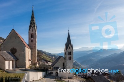 Parish Church And St Micheal's Church In Villanders Stock Photo