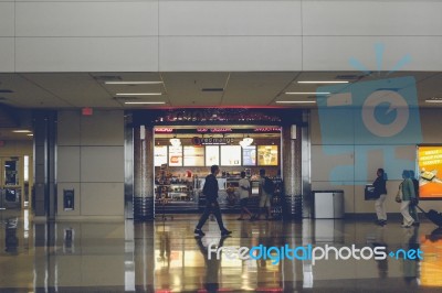 Passengers In An Airport Stock Photo