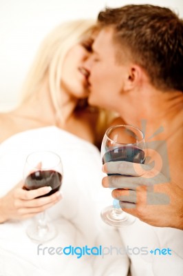 Passionate Married Couple Kissing Stock Photo