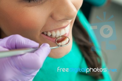 Patient And Dentist In The Dental Practice Stock Photo