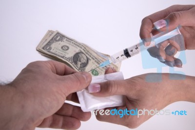 Payment Of A Drug Dose Stock Photo