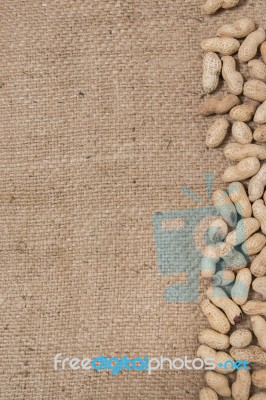 Peanuts On A Burlap Background Stock Photo