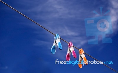 Pegs On A Line Stock Photo