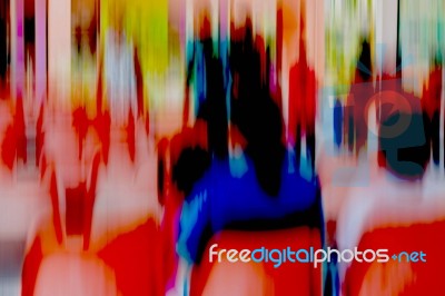 People Are Sitting At The Train Station Stock Photo