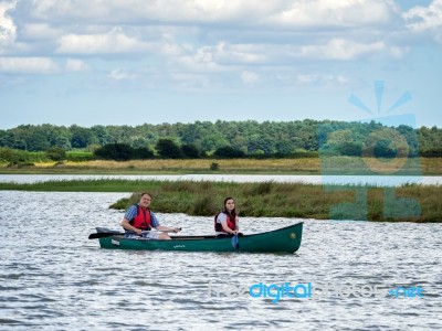 People Canoeing On The River Alde Stock Photo