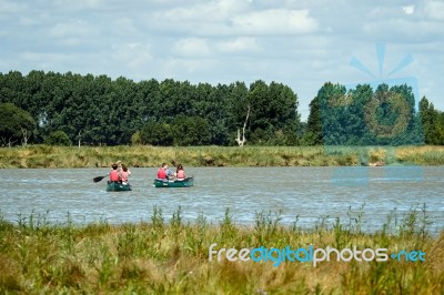 People Canoeing On The River Alde Stock Photo