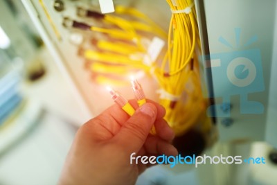 People Fix Node Fiber Optic In Network Room Stock Photo