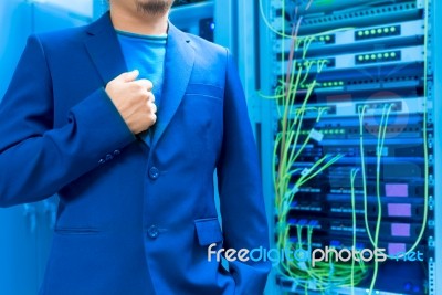 People Fix Node Fiber Optic In Network Room Stock Photo