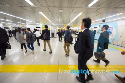 People Hurry At Shinjuku Station, Tokyo Stock Photo