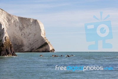 People Kayaking Off The Needles Isle Of Wight Stock Photo