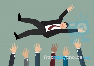 People Throw A Businessman In The Air Stock Image