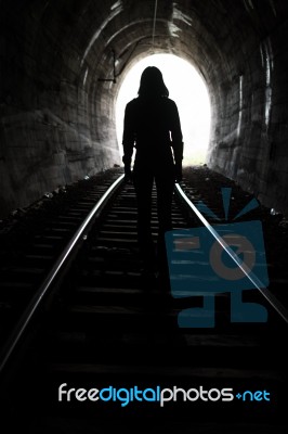 Person At End Of Tunnel Stock Photo