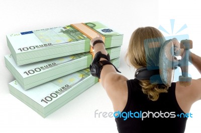 Person Indicating The Bundles Of Euro Note With Skateboard Stock Photo