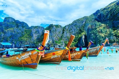 Phi-phi Island, Krabi, Thailand - November 11, 2016: Longtrail B… Stock Photo Phi-phi Island, Krabi, Thailand - November 11, 2016: Longtrail B… Stock Photo
