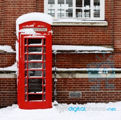 Phonebox In The Snow Stock Photo