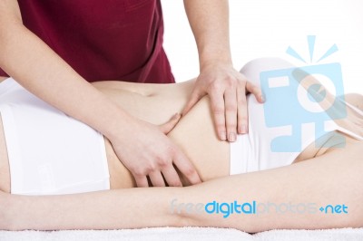 Physiotherapist Doing A  Diaphragm Massage To A Woman Patient Stock Photo