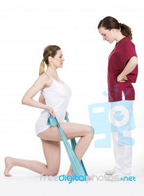 Physiotherapist Doing Tone With Flexible For Spine Stock Photo