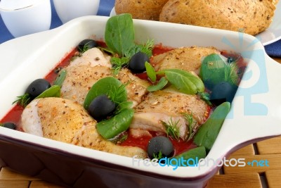 Pieces Of Chicken In Tomato Sauce Stock Photo