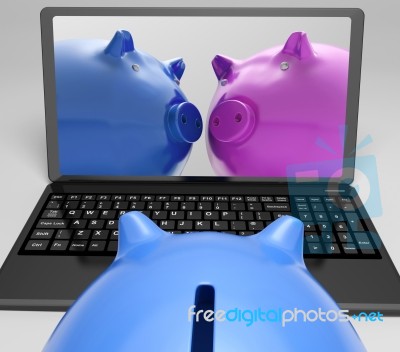 Piggybanks On Notebook Showing Online Transactions Stock Image