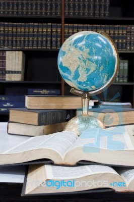 Pile Of Books And Globe Stock Photo