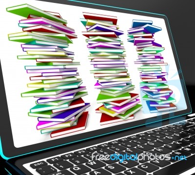 Pile Of Books On Laptop Showing Studying Stock Image