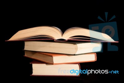 Pile Of Books With A Black Background Stock Photo Pile Of Books With A Black Background Stock Photo