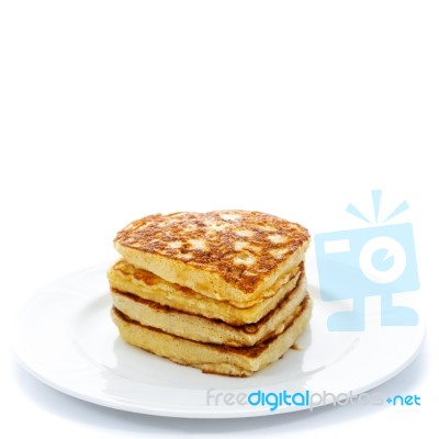 Pile Of Heart Shaped Pancakes On White Plate Stock Photo