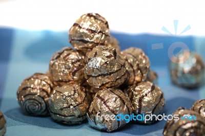 Pile Of Sweet Round Chocolate Candies Stock Photo