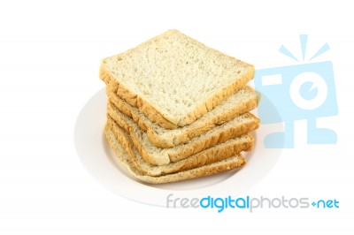 Pile Of Wheat Slice Bread Dish On White Background Stock Photo