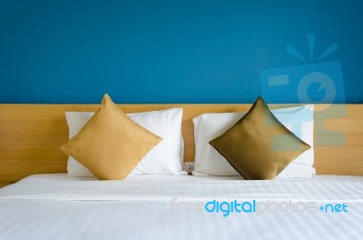 Pillows On Bed Stock Photo
