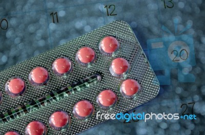 Pills And Calendar Stock Photo