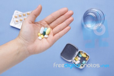 Pills And Capsule On Hand Stock Photo