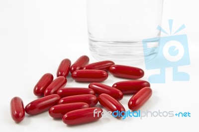 Pills With Water Glass Stock Photo