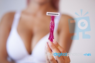 Pink Hair Attractive Woman Hold Pink Female Shaver In Hand Stock Photo