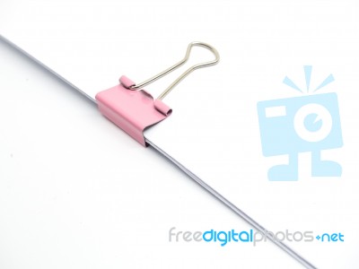 Pink Paperclip Attached On White Paper Isolated Stock Photo