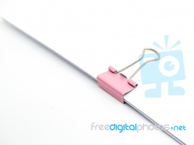 Pink Paperclip Attached On White Paper Isolated Stock Photo