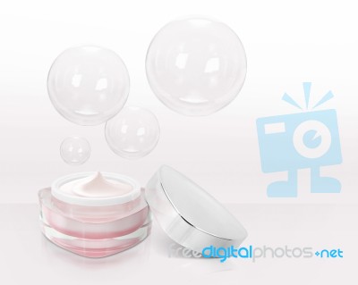 Pink Triangle Cosmetic Jar On Bubble Background Stock Photo