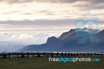 Pipeline With Mountain Stock Photo