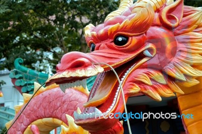 Plastic Model Of A Dragon In A Singapore Street Stock Photo