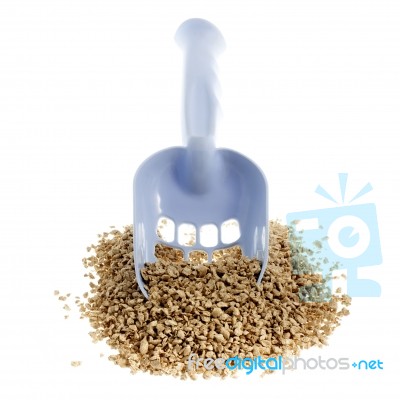 Plastic Scoop For Cleaning Cat Litter And A Pile Of Filler On A Stock Photo