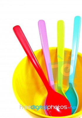Plastic Spoons In Bowl Stock Photo