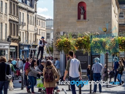 Playing The Violin Whilst Balancing On A Titghtrope Stock Photo