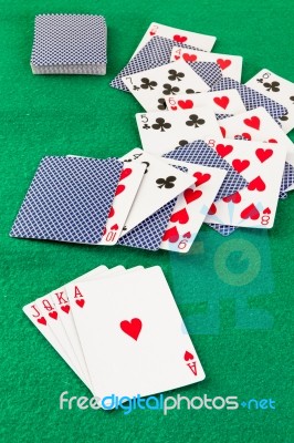 Poker  Cards On Green Baize Casino Stock Photo